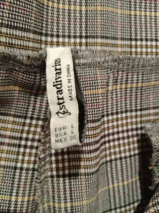 Pantalones de cuadros grises y blancos