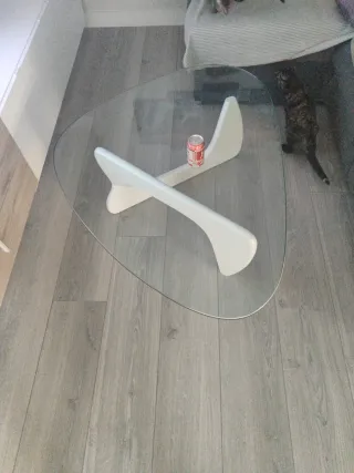 Tavolo da centro in vetro con supporto in legno