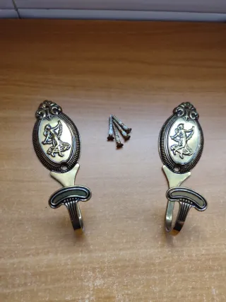 Soportes para cortinas dorados (2 unidades)