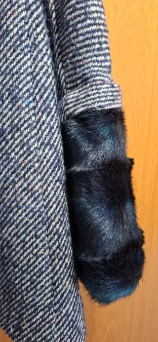 Abrigo arggido  elegante con detalles de pelo