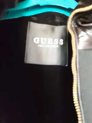 Plumífero negro largo