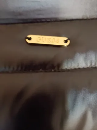 Plumífero negro largo