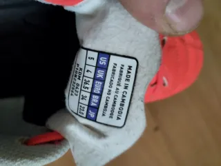 Botas de fútbol Mizuno niño naranjas