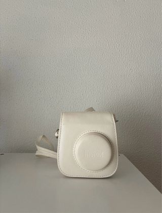 Instax Mini 11 azul pastel + funda + 14 fotos