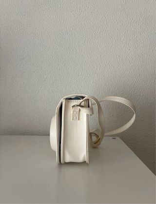 Instax Mini 11 azul pastel + funda + 14 fotos