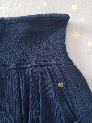 Falda corta azul chica