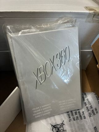 Caja y manuales Xbox 360 Arcade + videojuego