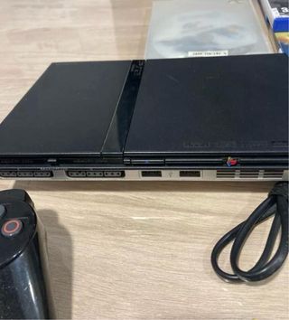 Pack Playstation 2 de Sony con juegos y mandos.