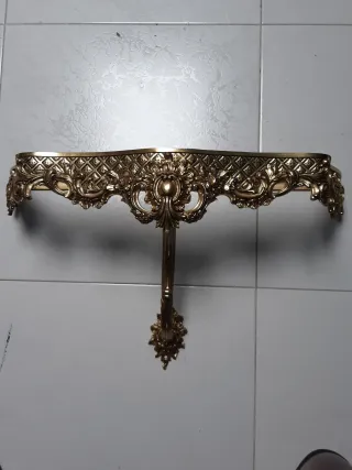 Consola de bronce para pared