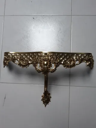 Consola de bronce para pared