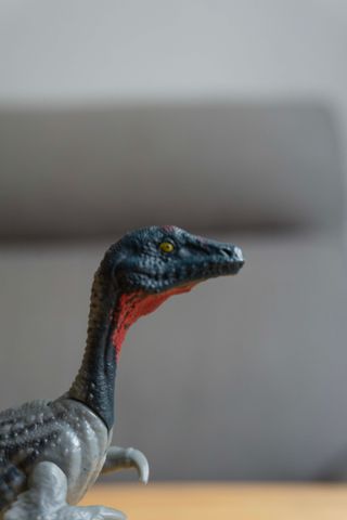 Dinosaurio de juguete realista