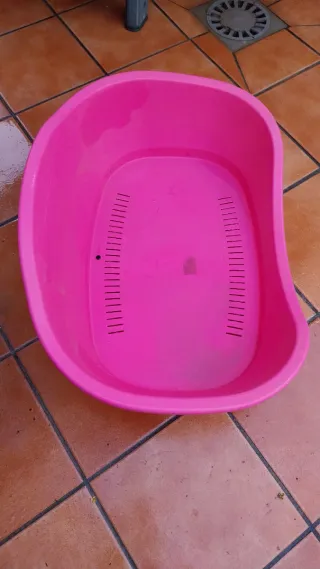 Cama para perro rosa