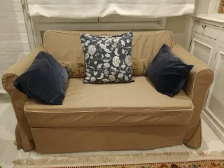 Sofá cama beige y azul