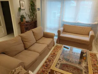 Sofá cama beige y azul