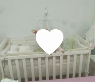 Cuna de madera blanca