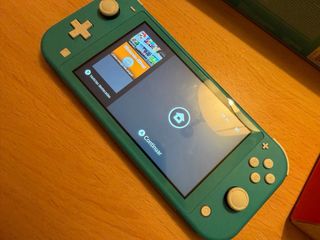 Nintendo Switch Lite Turquesa + Funda AC