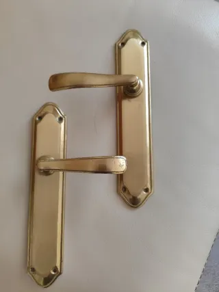 Juego de manillas doradas para puertas