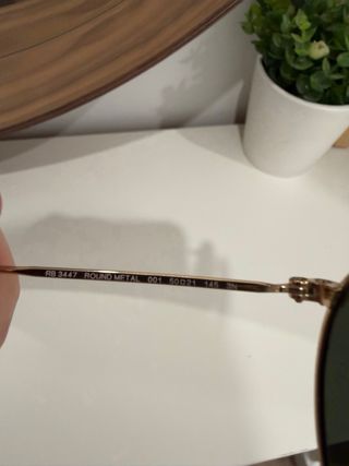 Gafas de sol Ray-Ban doradas y verdes