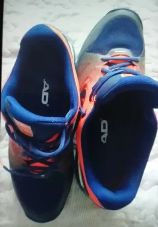 Zapatillas Head azules y naranjas