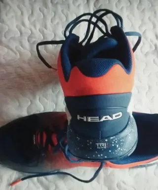 Zapatillas Head azules y naranjas
