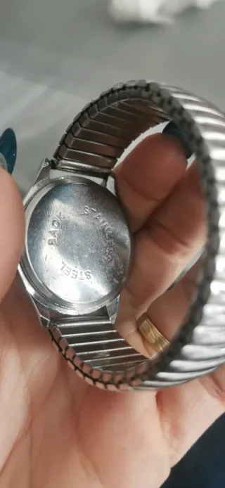 Relojes unisex Crown plateados y blancos