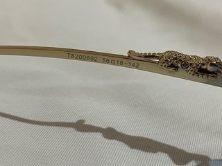 Gafas de lujo doradas y azules (Cartier)