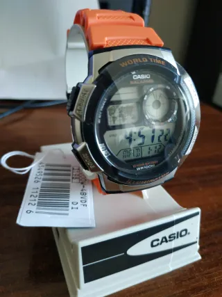 Reloj Casio Digital WR100M Naranja/Plata