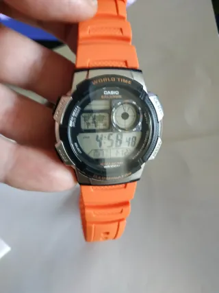 Reloj Casio Digital WR100M Naranja/Plata