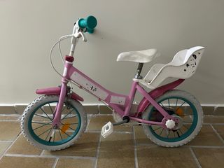 Bicicleta infantil rosa de Minnie con asiento