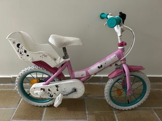 Bicicleta infantil rosa de Minnie con asiento