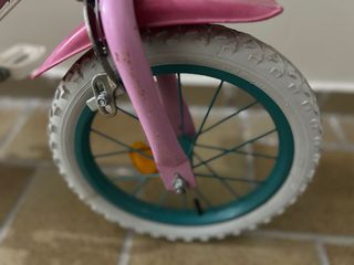 Bicicleta infantil rosa de Minnie con asiento