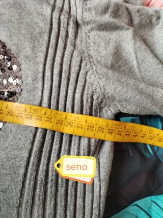 Maglia grigia con punto interrogativo