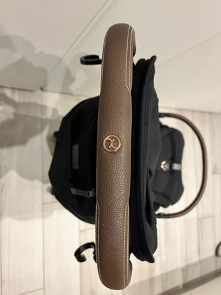 Passeggino Cybex Coya nero con frame goldrose