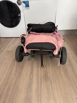 Silla de paseo bebé rosa y negra
