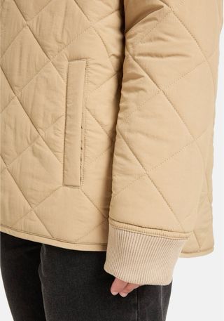 Chaqueta Quiksilver acolchada beige