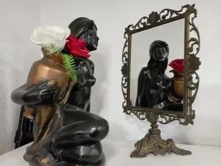 Antiguo espejo de bronce