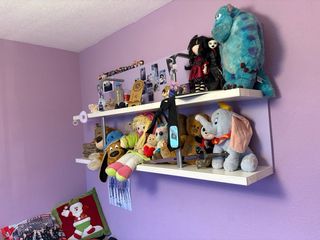 Mueble infantil con cajones morado y blanco