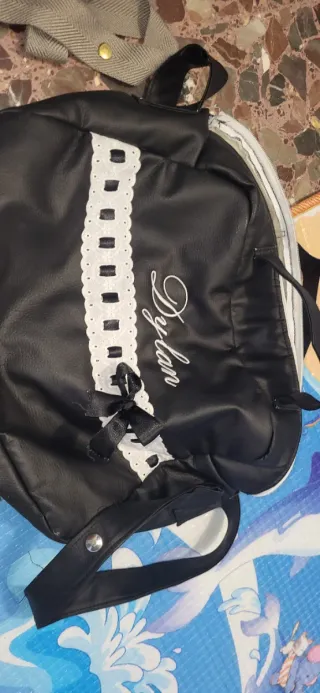 Bolso de carro negro con encaje