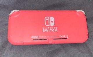 Nintendo Switch Lite + Cargador + Fundas + Juegos