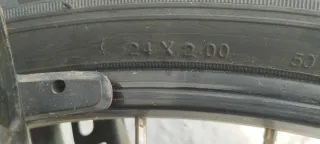 Bicicleta infantil Btwin negra y naranja 24"