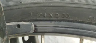 Bicicleta infantil Btwin negra y naranja 24"