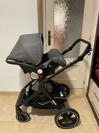 Cochecito bebé con silla de coche gris