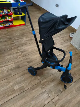 Triciclo infantil con capota y manillar