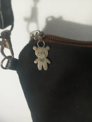 Bolso terciopelo negro con estrella plateada