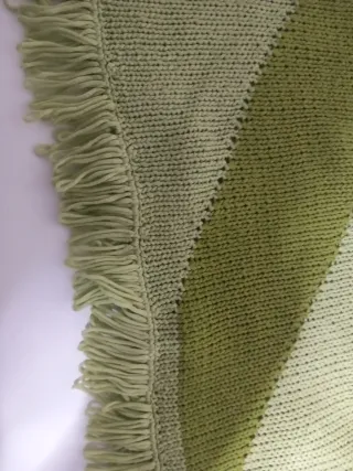 Jersey verde con flecos