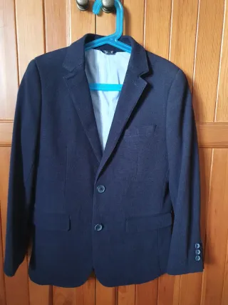 Americana niño azul marino, marca Tizzas.