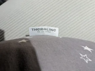 Cojín de lactancia gris estrellas