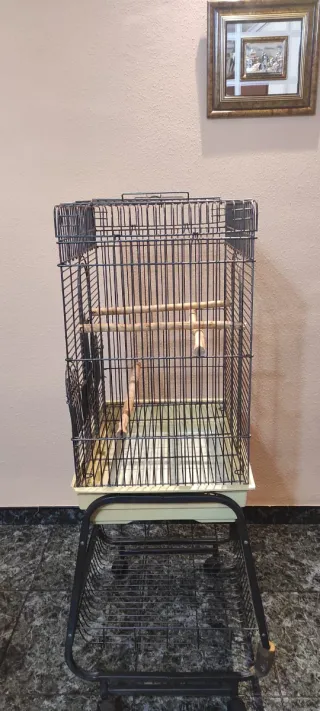 Jaula para pájaros negra y beige