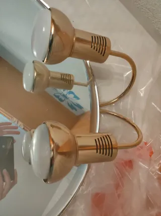 Espejo con apliques dorados