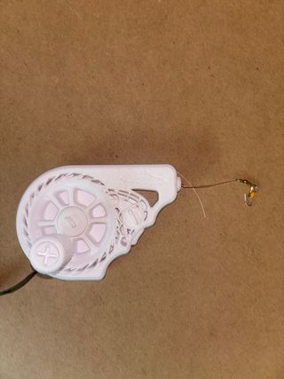 Caña de pescar de bolsillo